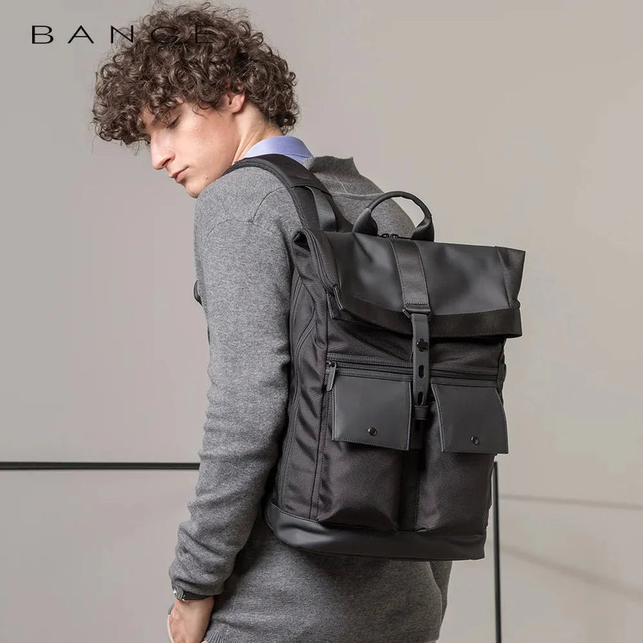 Roll-top backpack worn on the street — lifestyle
